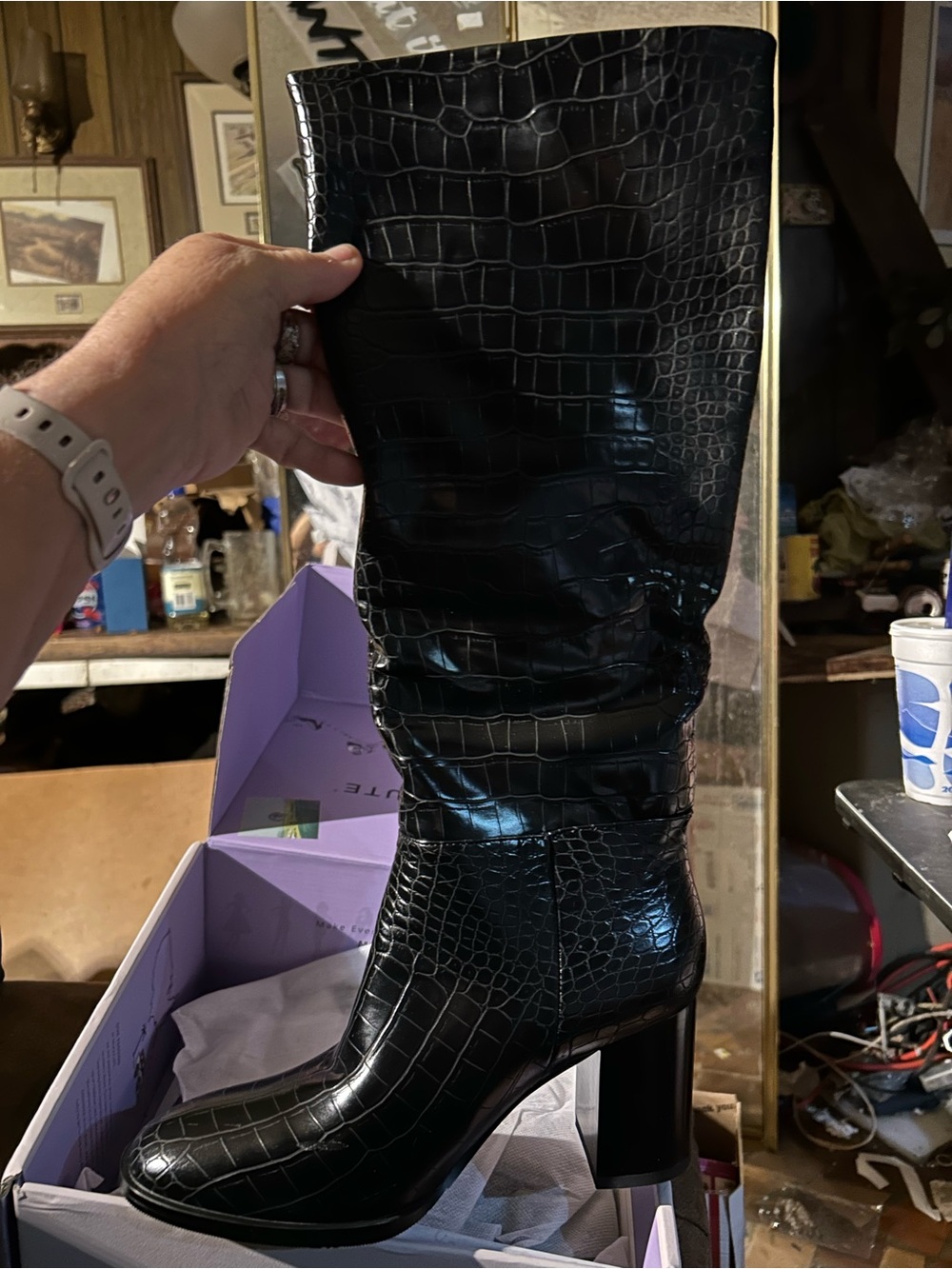 Black stone design ladies tall boots.